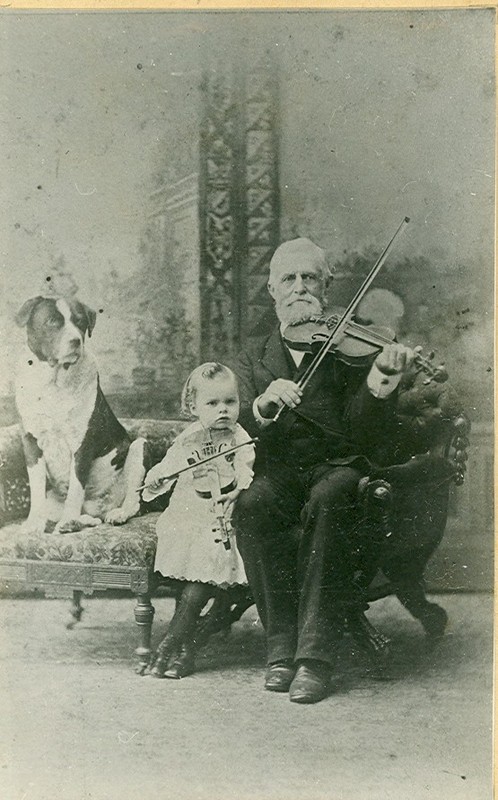 Brooks Husted and Tige with violin.jpg