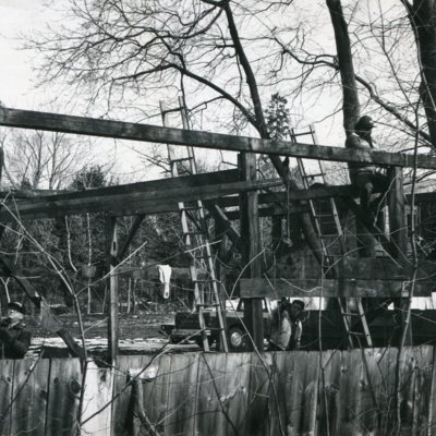 men building wooden frame Feb87.jpg