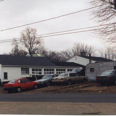 River Street, car repair business, torn down, taken March 4, 2001, entrance to Walgreen's.jpg