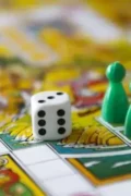 picture of a board game with dice and pawns