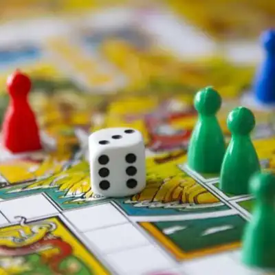 picture of a board game with dice and pawns