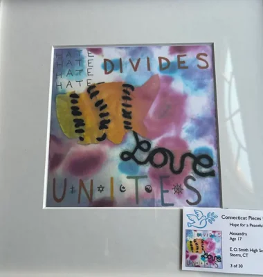 A framed piece of artwork that is part of the Connecticut pieces for piece art show